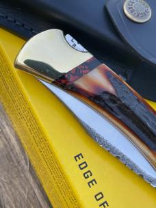 BUCK 110 LEROY REMER CUSTOM AMBER STAG KNIFE