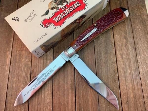 Winchester Cartridge Series Banana Trapper Burnt Orange Winchester Jigged Bone 1994