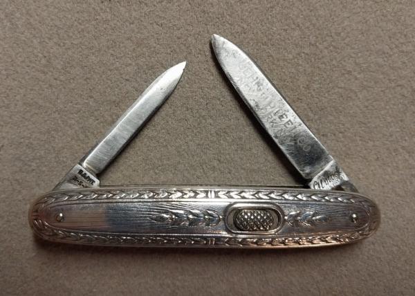 3 3/8" Flylock Nickel Silver Double Blade with Etch.