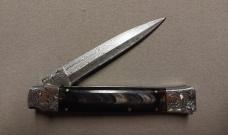 12" Picklock Switchblade with Damascus Blade and Buffalo horn handles.