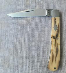 John Lloyd Mammoth Ivory Slimline Trapper...4.25" closed...52100 steel..SS bolsters and shield..slip