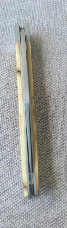 John Lloyd Mammoth Ivory Slimline Trapper...4.25" closed...52100 steel..SS bolsters and shield..slip