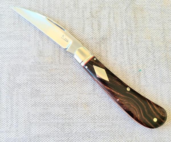 K'roo Desert Ironwood Swayback..Rwl34...3.75" closed...filework..fluted..red liners..coa and slip