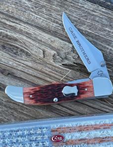 CASE BROTHERS ** CHESTNUT BONE BADGE SHIELD MID FOLDING HUNTER