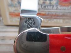 Case XX Copperhead   Red Jigged Peach Seed Bone Handles 