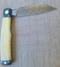  K'roo Native.. 4"..Black Linen bolsters&caps..Warthog Tusk Ivory Scales..red accents..Damasteel 