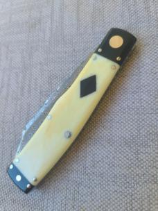  K'roo Native.. 4"..Black Linen bolsters&caps..Warthog Tusk Ivory Scales..red accents..Damasteel 