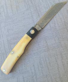  K'roo "Mac" Knife...3.5" clsd...Black Linen bolsters..Warthog Tusk Ivory Scales....Damasteel..coa. 