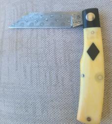  K'roo "Mac" Knife...3.5" clsd...Black Linen bolsters..Warthog Tusk Ivory Scales....Damasteel..coa. 