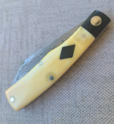  K'roo "Mac" Knife...3.5" clsd...Black Linen bolsters..Warthog Tusk Ivory Scales....Damasteel..coa. 