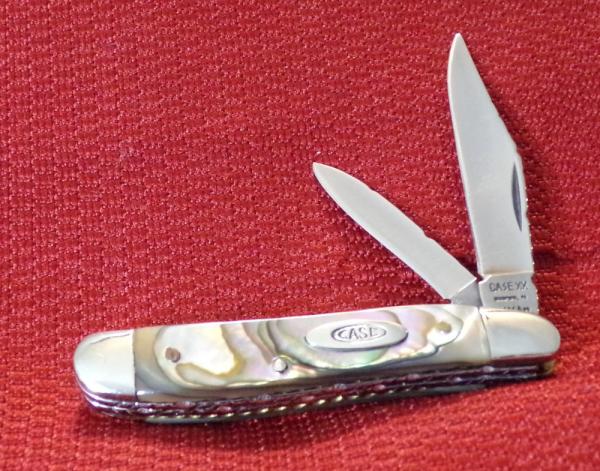  1993 CASE XX USA PEANUT WITH CUSTOM FILE WORK AND ABALONE HANDLES  (M.O. OR CHECK )