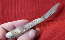  1993 CASE XX USA PEANUT WITH CUSTOM FILE WORK AND ABALONE HANDLES  (M.O. OR CHECK )