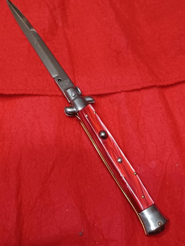 11" Vintage Stiletto Italy red acrylic. 