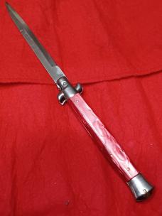 11" Vintage Stiletto Italy red acrylic. 