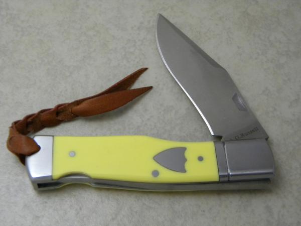 A.G. Russell Yellow Lockback Gunstock Knife A.G. Russell Yellow Lockback Gunstock Knife