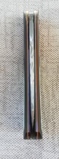 Johan Ellis Lion 4",Damasteel with Giraffe Bone inlays and Paper Micarta Frame over G10 and titanium