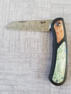 Johan Ellis Lion 4",Damasteel with Giraffe Bone inlays and Paper Micarta Frame over G10 and titanium