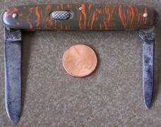 Vintage FLYLOCK 2 blade knife with red & grey celluloid handles