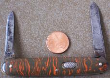 Vintage FLYLOCK 2 blade knife with red & grey celluloid handles