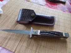 Never Used Large swing guard auto knife by Afaag signed