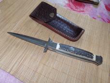 Never Used Large swing guard auto knife by Afaag signed