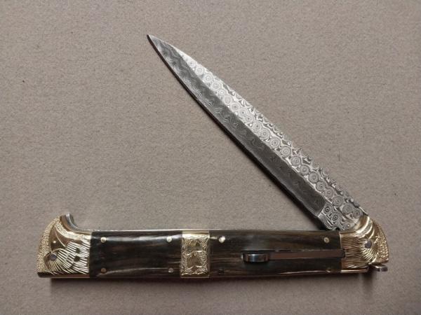 13" Double Eagle Picklock Switchblade. Damascus Blade and Snake-eater Ram Horn handles.