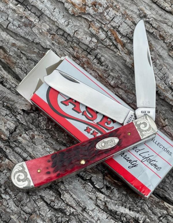 CASE XX ** 1988 RED JIGGED BONE SCROLLED RAZOR TRAPPER 