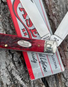 CASE XX ** 1988 RED JIGGED BONE SCROLLED RAZOR TRAPPER 
