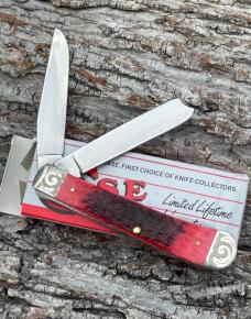 CASE XX ** 1988 RED JIGGED BONE SCROLLED RAZOR TRAPPER 