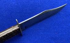 The Marion Line Knife in good, lightly used condition. Jig-bone Scales. .......................(TML)