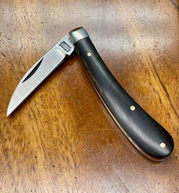 A Wright & Son "Ettrick" Carving Knife with Ebony Handles and Curved Wharncliffe Blade A Wright & Son "Ettrick" Carving Knife with Ebony Handles and Curved Wharncliffe Blade