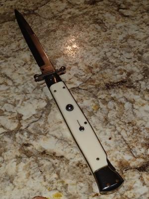 Frank B. 11" Imitation Ivory swinguard.