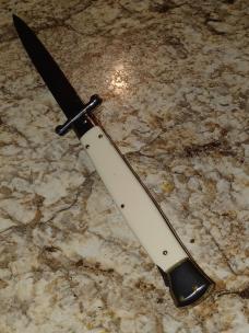 Frank B. 11" Imitation Ivory swinguard. 