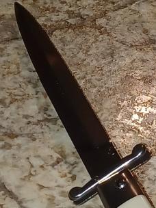 Frank B. 11" Imitation Ivory swinguard. 