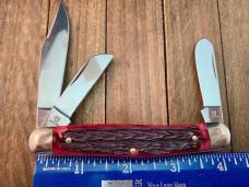 Hen and Rooster Cattle Rustler Stockman Red Jigged Bone Steer Head Shield