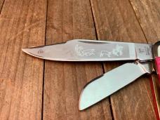 Hen and Rooster Cattle Rustler Stockman Red Jigged Bone Steer Head Shield