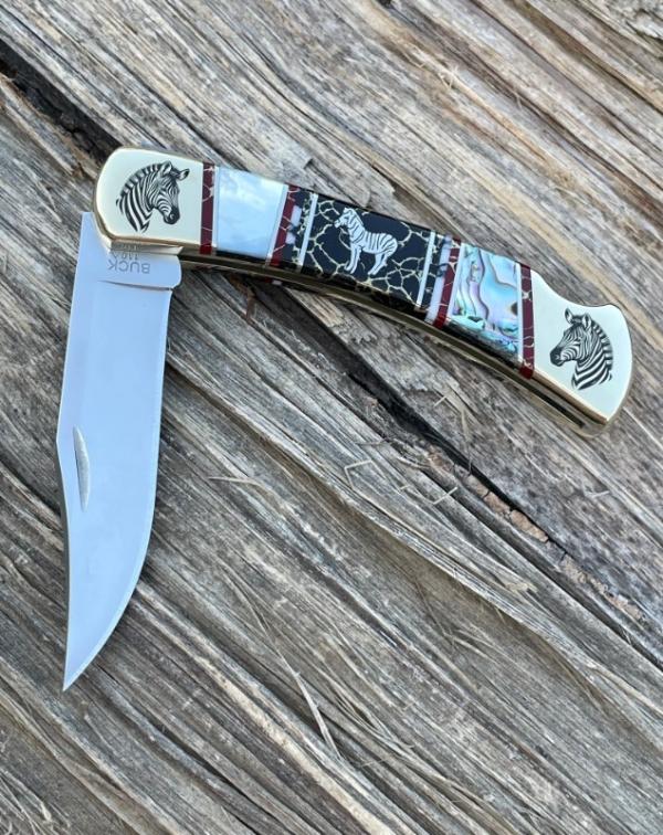 BUCK 110 ** BRIAN YELLOWHORSE CUSTOM ZEBRA MOTHER OF PEARL-ABALONE-BLACK GOLD QUARTZ BRASS BOLSTERS BUCK 110 ** BRIAN YELLOWHORSE CUSTOM ZEBRA MOTHER OF PEARL-ABALONE-BLACK GOLD QUARTZ BRASS BOLSTERS
