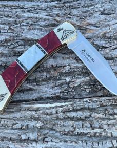 BUCK 110 ** BRIAN YELLOWHORSE CUSTOM VOLCANO MOTHER OF PEARL-RED GOLD ACRYLIC BRASS BOLSTERS