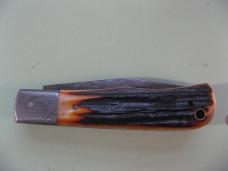 DANIELS FAMILY KNIFE BRANDS-EXCELSIOR KNIFE CO-ALL AMERICAN TRAPPER AMBER STAG PROTO