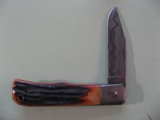 DANIELS FAMILY KNIFE BRANDS-EXCELSIOR KNIFE CO-ALL AMERICAN TRAPPER AMBER STAG PROTO