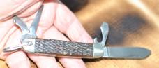 Kutmaster Utica New York  USA 4 Blade Utility Jigged Bone 3 1/2" Closed Factory Snap 