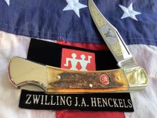 J A Henckels Large  5" Folding Hunter with Super Stag Handles in display. NOS and a beauty
