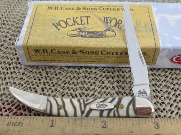Case XX 2005 Lepard Skin Bone Tiny Texas Toothpick Pattern # 610096 SS Case XX 2005 Lepard Skin Bone Tiny Texas Toothpick Pattern # 610096 SS