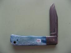 DANIELS FAMILY KNIFE BRANDS-EXCELSIOR KNIFE CO-ALL AMERICAN TRAPPER OLYMPIC BLUE GIRAFFE BONE