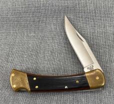 Buck 110 Lockback – Rosewood & Brass – 2010 with Brown Leather Sheath