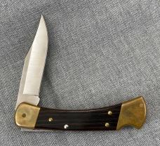 Buck 110 Lockback – Rosewood & Brass – 2010 with Brown Leather Sheath