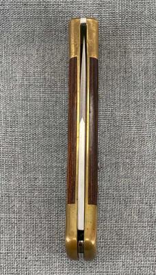 Buck 110 Lockback – Rosewood & Brass – 2010 with Brown Leather Sheath