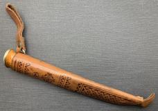 Oss Ruutel fixed blade sheath knife made in Finland with wonderful etching on the blade. Light use. 