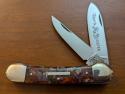 FIGHT'N ROOSTER 3 3/4" COPPERHEAD CANOE IN RARE PURPLE SWIRL CELLULOID 