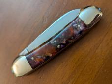 FIGHT'N ROOSTER 3 3/4" COPPERHEAD CANOE IN RARE PURPLE SWIRL CELLULOID 
